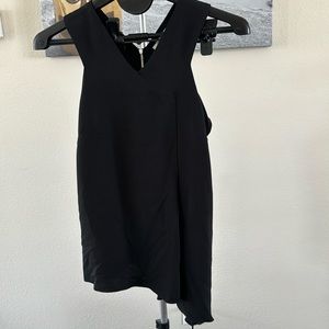 Great night out dressy asymmetrical top with zip detail on back